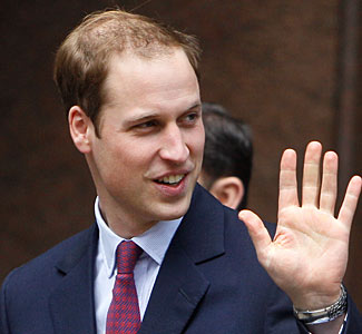 Prince William's left hand.